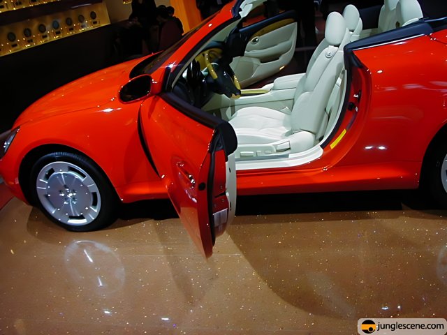 Red Sports Car with Open Doors