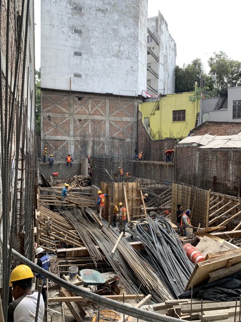 Busy Workers on a Construction Site