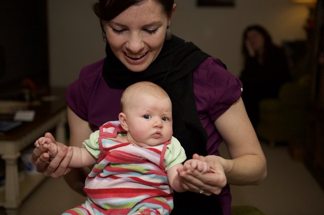 Mother and Baby Share a Joyful Moment Indoors