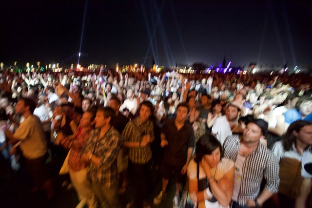 A Sea of Music Fans under the Night Sky