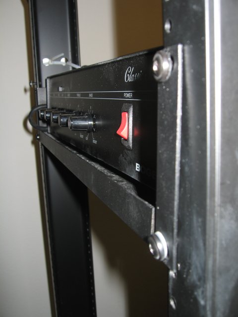 Red Button on Metal Rack