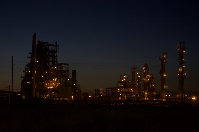 Illuminated Refinery at Night