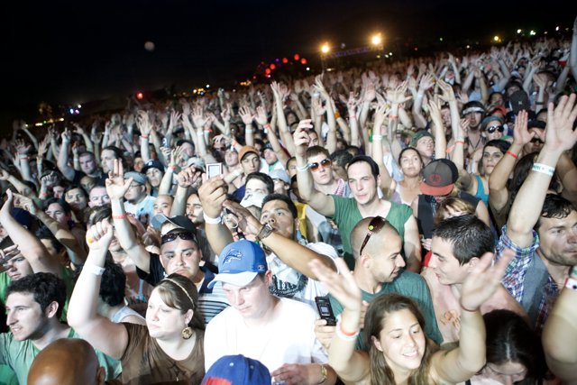 Hands Up in the Night Sky at Coachella Saturday