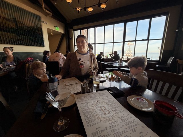 Family Dining Together at Waterfront Restaurant