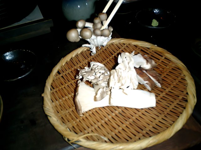 Fresh Mushrooms in a Rustic Basket