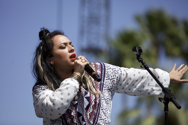 Singer Belts Out a Hit Song Under the Blue Skies of Coachella
