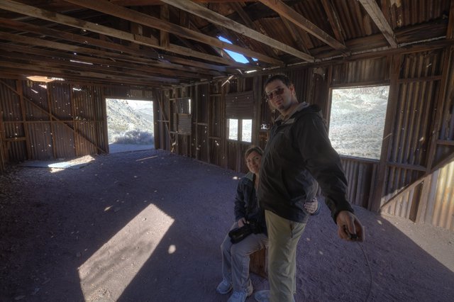 Explorers Inside Abandoned Desert Shack, Death Valley