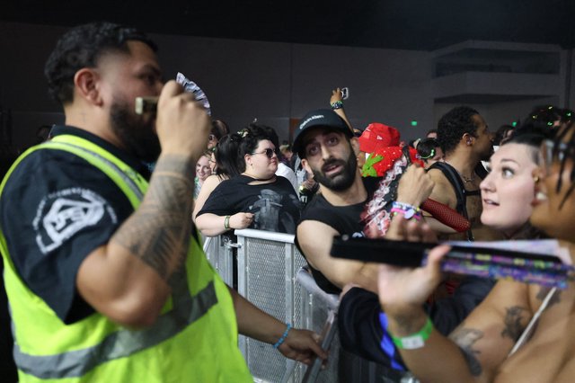 Concert Crowd Presses Against Security Barrier at Wobbleland