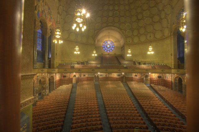 Majestic Auditorium with Stained Glass and Chandeliers