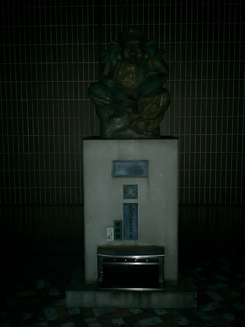 Statue atop a Water Machine