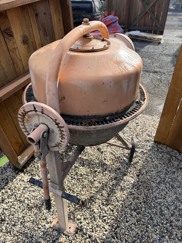 Vintage Copper Kettle Grill on Gravel Patio