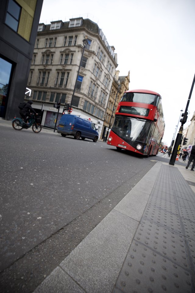 Modern Red Double-Decker Bus on London Street
