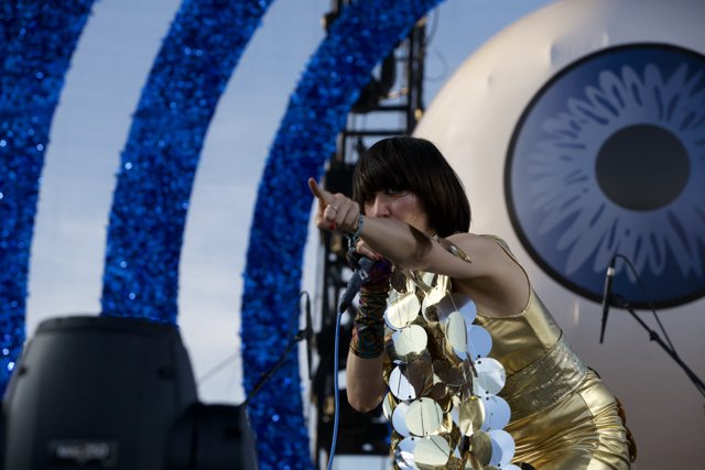 Karen Lee Orzolek commands the Coachella stage in a gold dress