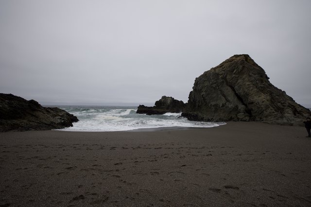 Moody Cove at Dusk with Dark Sand Beach