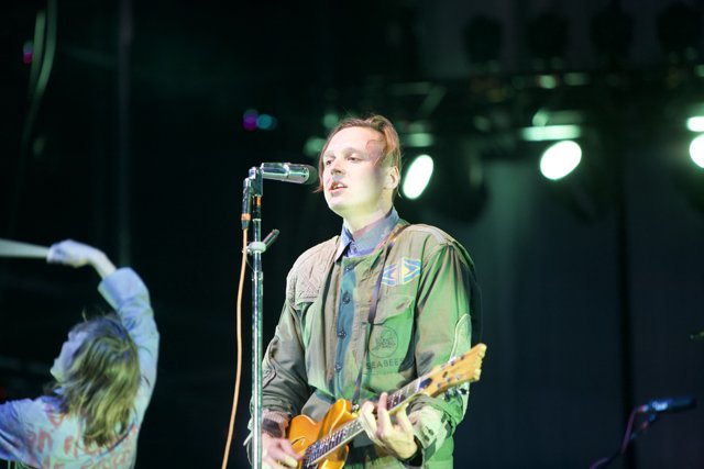 Win Butler Rocks the Crowd with his Guitar Skills