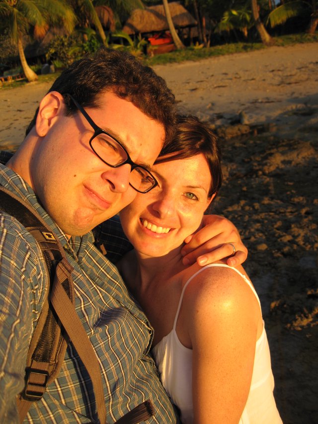 Couple Embracing at Golden Hour on Fiji Beach