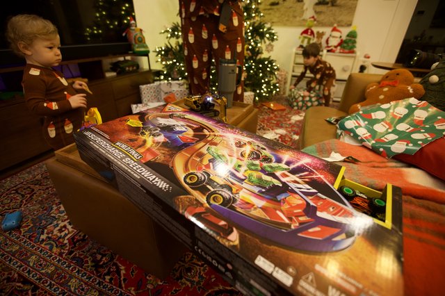 Christmas Morning: Excited Children Opening Presents