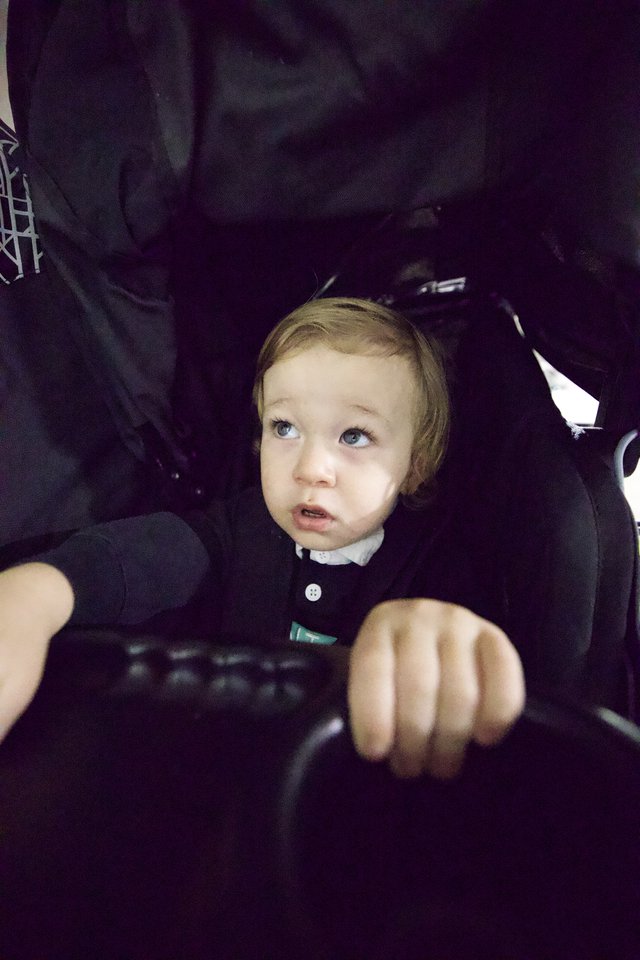 Toddler at Baby Rave Event in Dark Setting