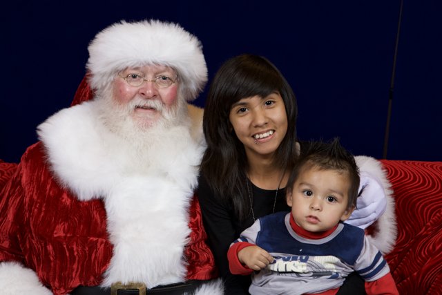 A Festive Family Photo with Santa Claus