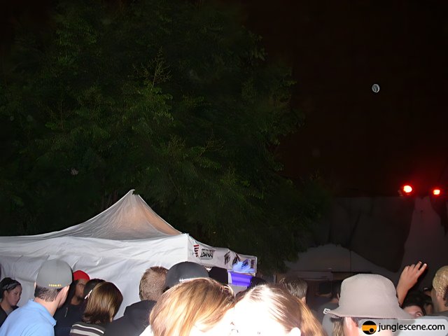 Illuminated Tent in a Concert Crowd