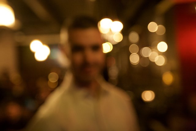 Blurred Man in the Urban Nightlife
