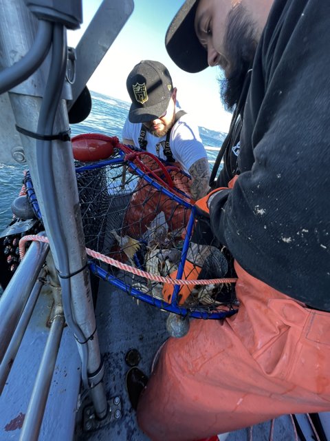 Two Men Hard at Work on Crab Traps in Gulf of the Farallones