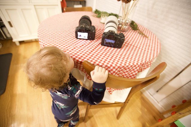 Toddler Reaching for Cameras on Christmas Morning
