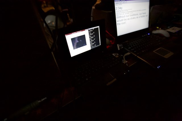 A Pair of Laptops on a Desk