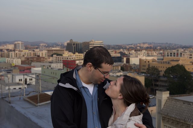 Rooftop Romance at Dusk Over the City