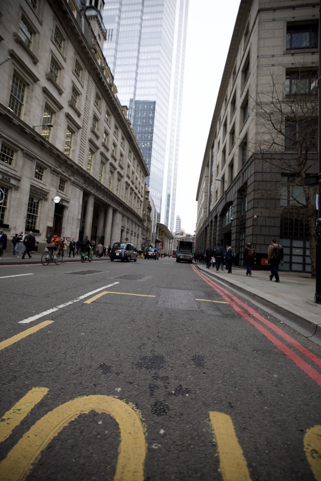 London City Street with Modern Skyscrapers Rising Above