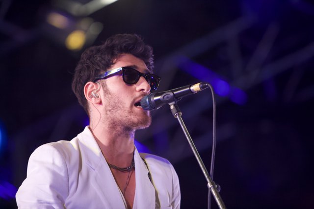 White Suit, Sunglasses, and Mic
