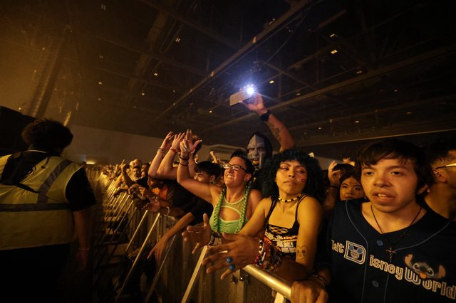 Ecstatic Fans Press Against the Barrier at Wobbleland
