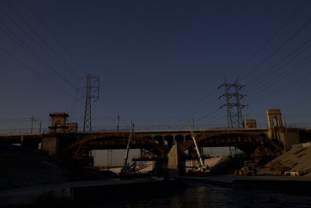 Overpass with Power Lines and Boat on LA River