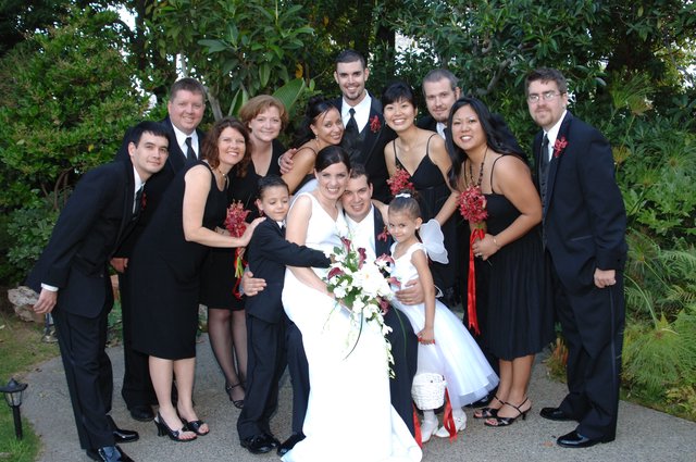 Joyful Wedding Party Celebration in Garden Setting