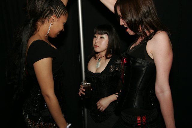 Trio in Black Corsets and Leather