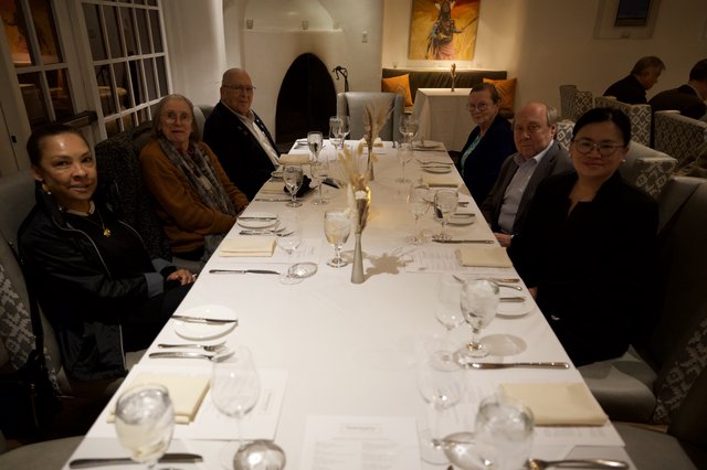 Elegant Dinner Gathering at Upscale Restaurant