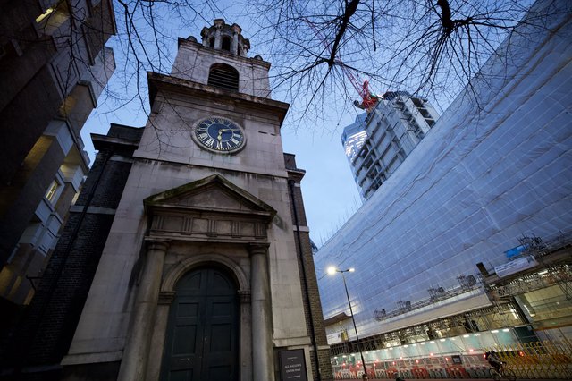 Historic Clock Tower Amid Modern London Development
