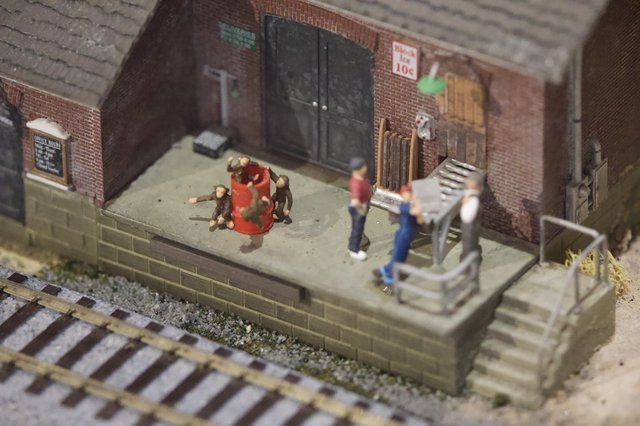 Miniature Railroad Diorama with Monkeys and Workers