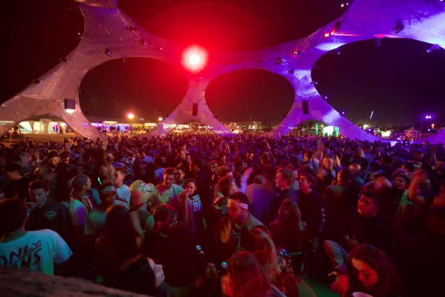 Partygoers under the Night Sky at Coachella Music Festival