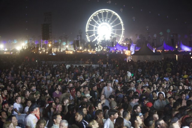 Coachella Music Festival Crowd Rides Ferris Wheel