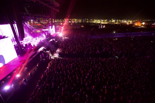 Coachella at Night: A Flare in the Crowd