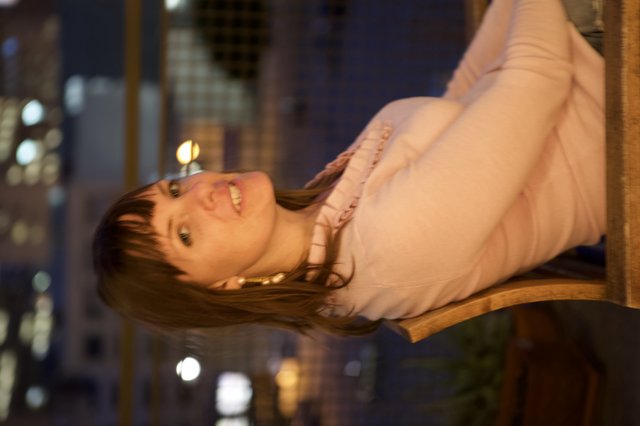 Penelope at Night: City Lights Bokeh Portrait