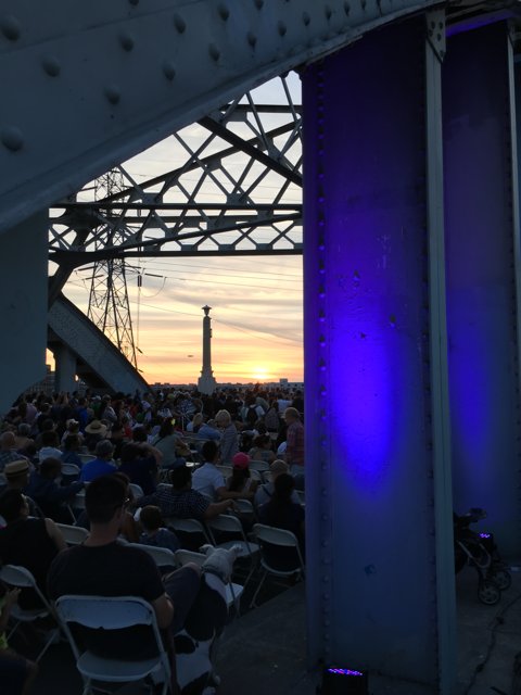 Sunset Gathering Under the Bridge