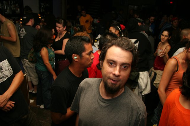 Bearded Man in a Nightclub Crowd