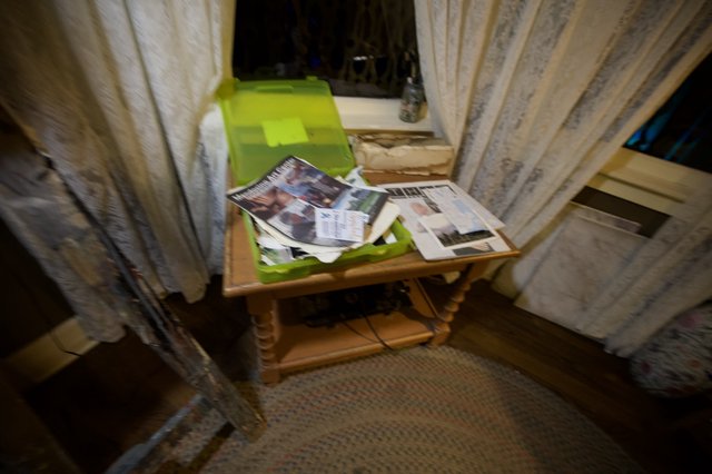 Cozy Corner with Green Storage Basket and Magazines