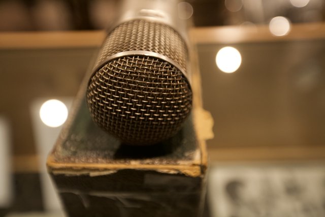 Vintage Microphone on Wooden Box