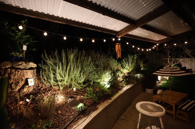 Cozy Illuminated Garden Patio at Night