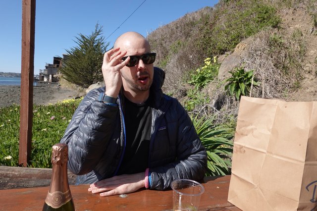 Coastal Picnic with Wine and Sunglasses