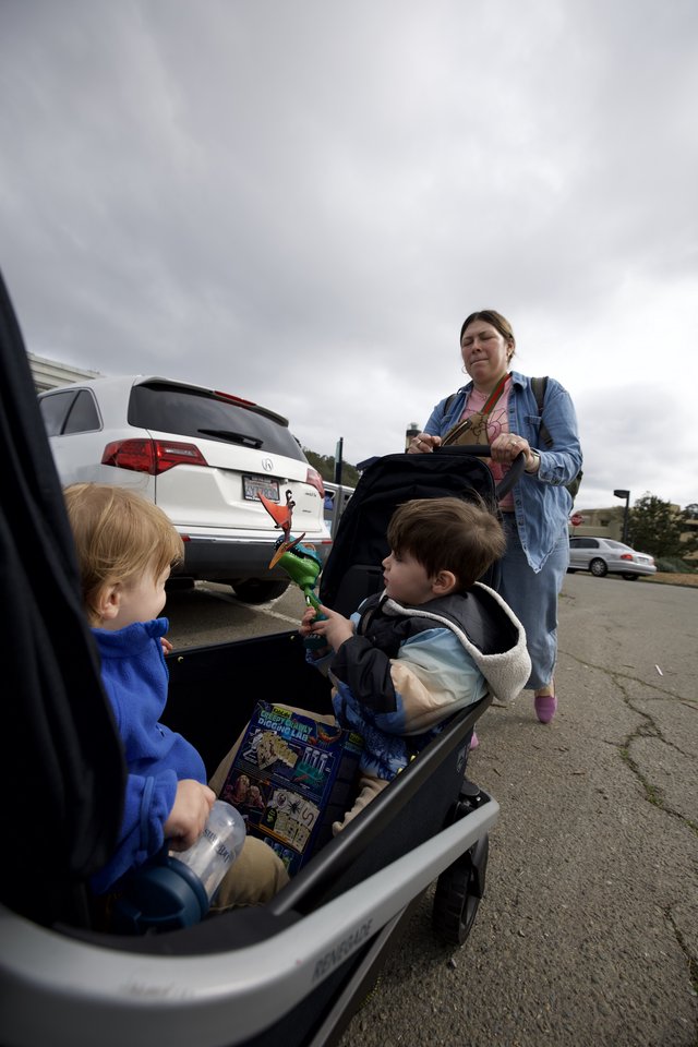 Family Shopping Trip in Parking Lot with Kids