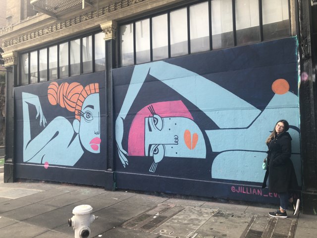 Two Women in Graffiti Mural